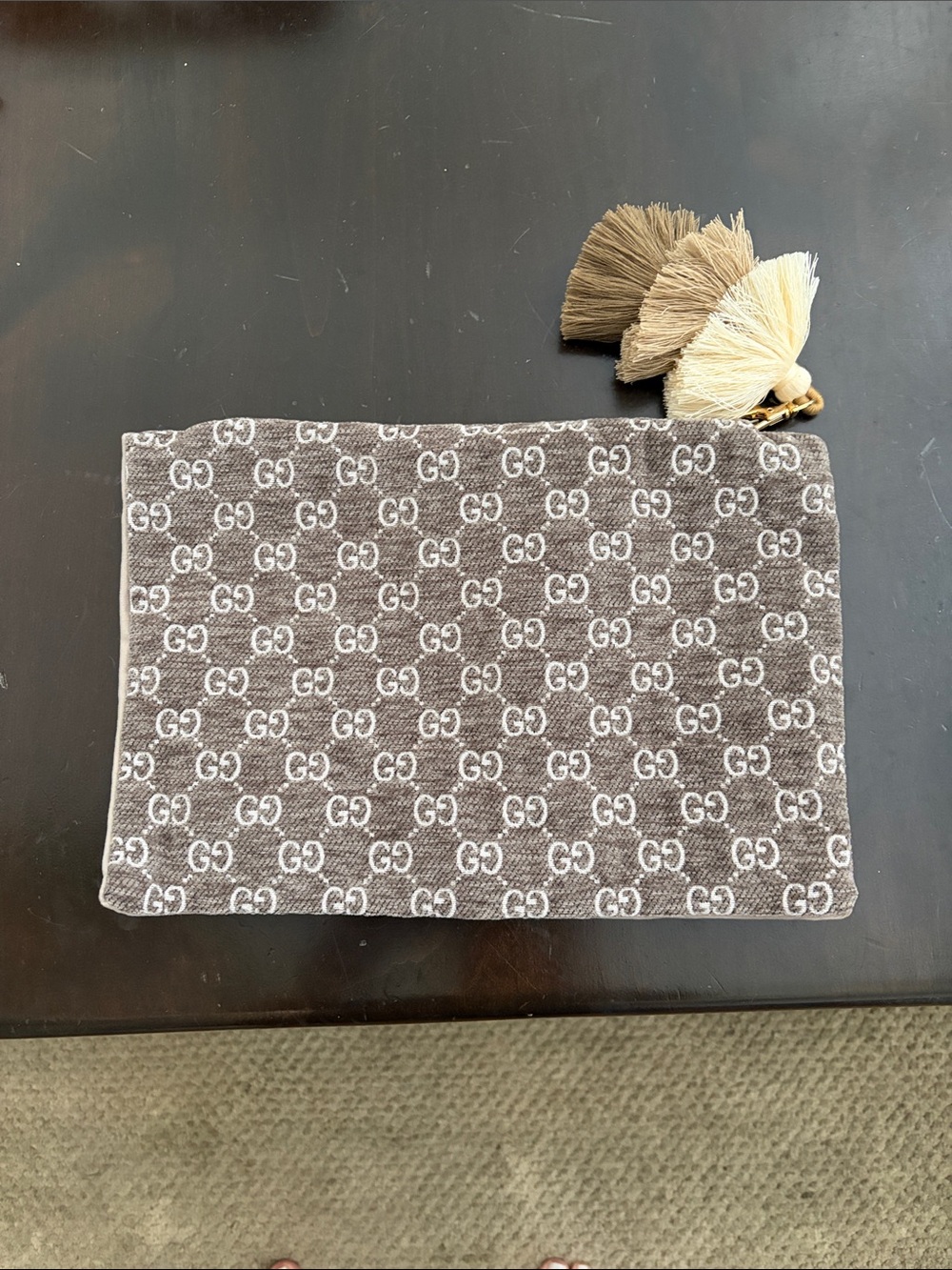 Repurposed designer pouch